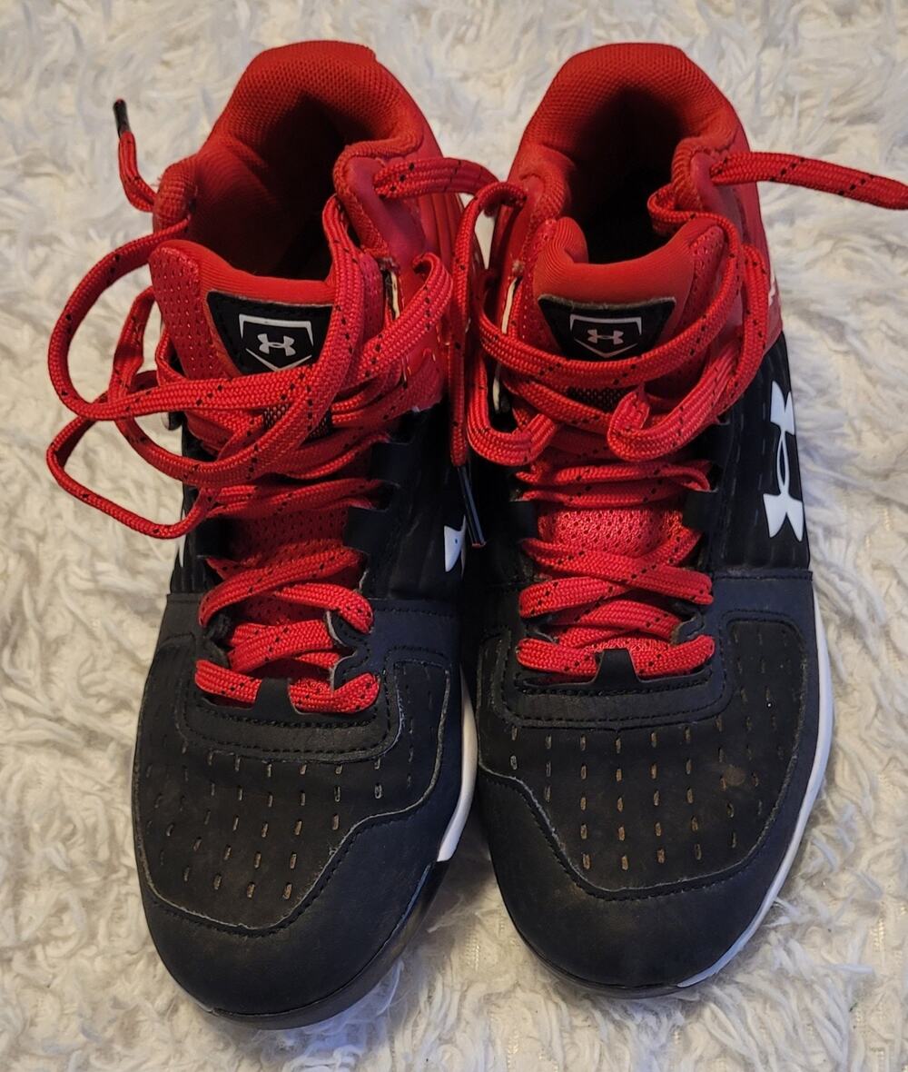Under Armour youth cleets red/black size 4Y